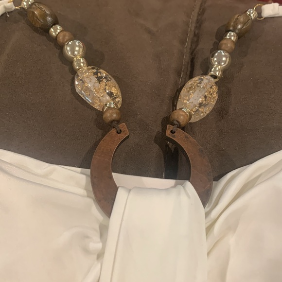 Beautiful Off White Top! Wear Strapless or with detachable accent strap. - Picture 4 of 5